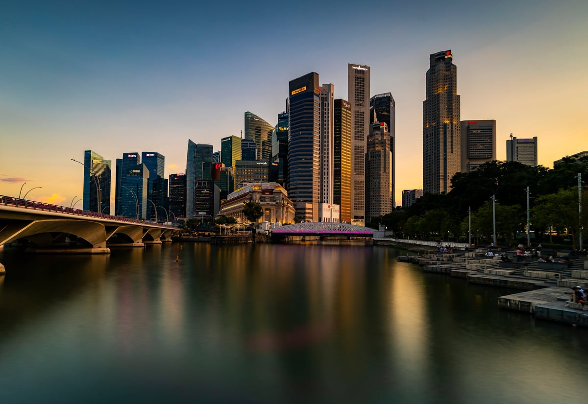 Singapore central business district skyline at dusk — international private jet charter to Asia and beyond